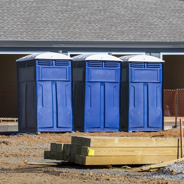 how often are the portable restrooms cleaned and serviced during a rental period in Oregon